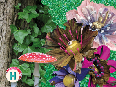 Rød fluesvamp, papirblomster og træstamme