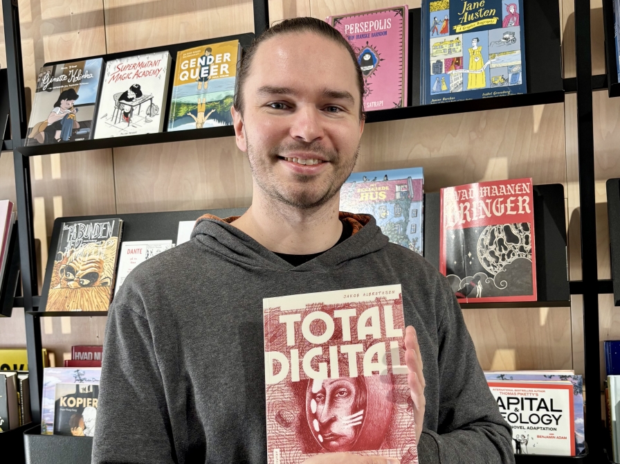 Kristian med bogen Total digtal 